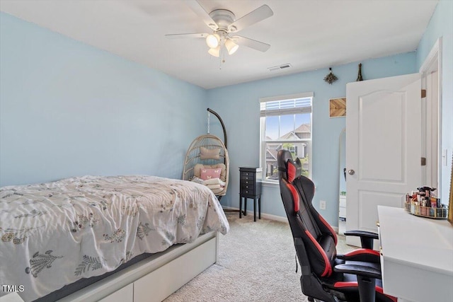 209 Sage Oak Ln, Holly Springs, NC 27540 - bedroom with light carpet, an office area, baseboards, and a ceiling fan