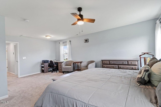 209 Sage Oak Ln, Holly Springs, NC 27540 - carpeted bedroom with baseboards, ceiling fan, and an office area