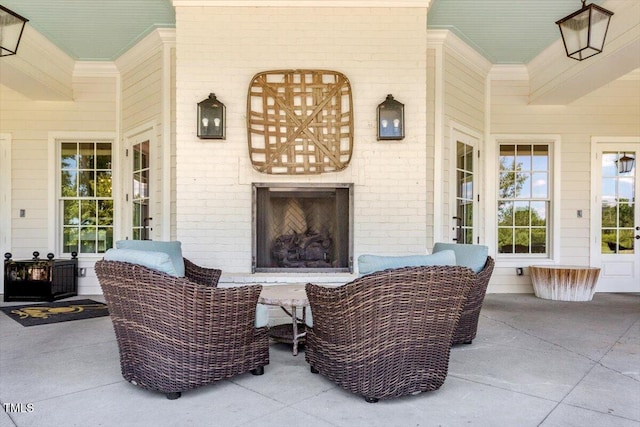 209 Sage Oak Ln, Holly Springs, NC 27540 - view of patio / terrace featuring an outdoor brick fireplace
