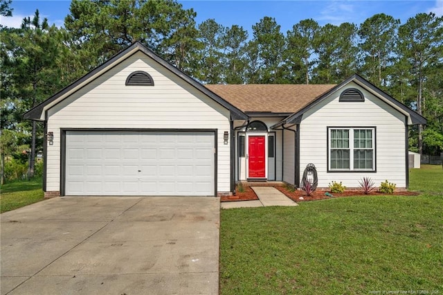 306 Longleaf Pines Dr, Raeford, NC 28376 - ranch-style home with concrete driveway, a garage, a front lawn, and a shingled roof