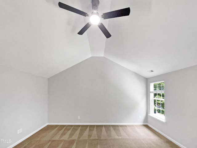 735 Sycamore Springs Dr, Fuquay Varina, NC 27526 - carpeted empty room with a ceiling fan, lofted ceiling, and baseboards