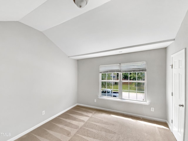 735 Sycamore Springs Dr, Fuquay Varina, NC 27526 - unfurnished room featuring vaulted ceiling, baseboards, and carpet flooring