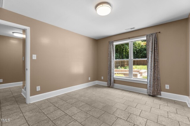 2712 Broad St, Durham, NC 27704 - unfurnished room with baseboards