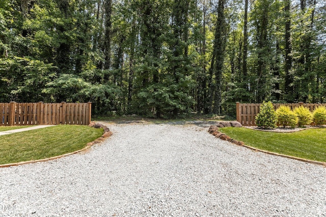 2712 Broad St, Durham, NC 27704 - view of dirt / gravel road featuring a view of trees