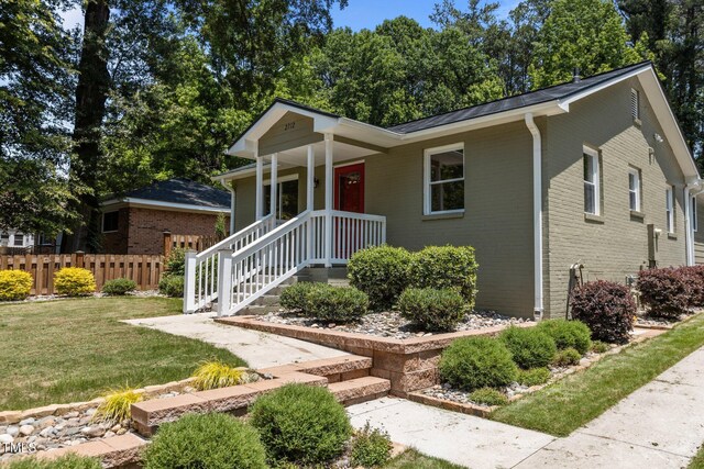 2712 Broad St, Durham, NC 27704 - ranch-style house featuring brick siding and metal roof