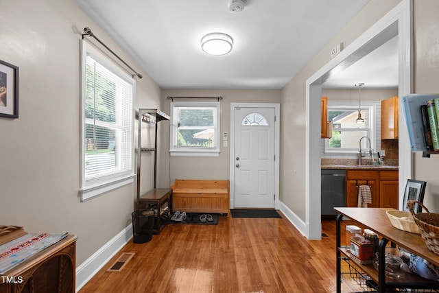 2710 Broad St, Durham, NC 27704 - foyer entrance with wood finished floors and baseboards