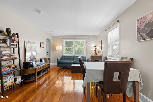 2710 Broad St, Durham, NC 27704 - dining room with wood finished floors and arched walkways