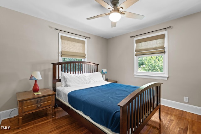 2710 Broad St, Durham, NC 27704 - bedroom with baseboards, hardwood / wood-style flooring, and a ceiling fan