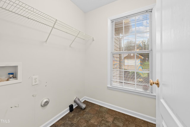 3027 Maple Unit T1, Burlington, NC 27215 - laundry room with baseboards, gas dryer hookup, hookup for a washing machine, and dark stone finish floors