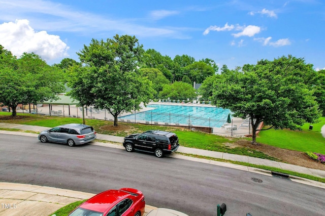 2001 Turtle Point Dr, Raleigh, NC 27604 - view of parking / parking lot featuring a community pool