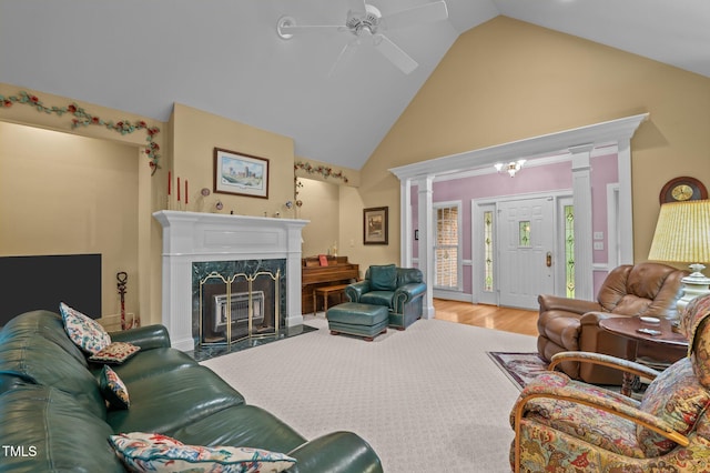 414 Bakewell Ct, Wake Forest, NC 27587 - living area featuring decorative columns, high vaulted ceiling, ceiling fan, wood finished floors, and a premium fireplace