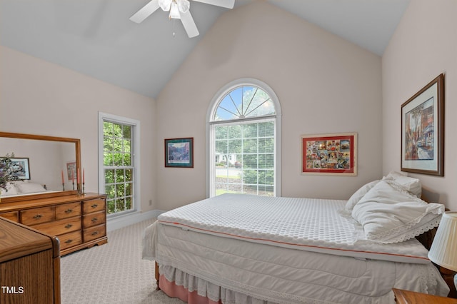 414 Bakewell Ct, Wake Forest, NC 27587 - carpeted bedroom with high vaulted ceiling, multiple windows, and a ceiling fan