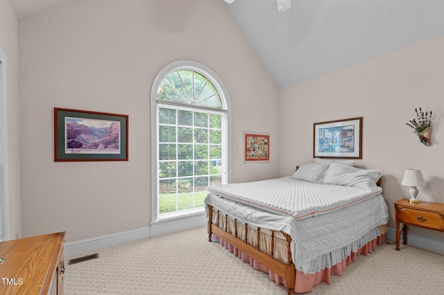 414 Bakewell Ct, Wake Forest, NC 27587 - bedroom featuring light carpet, lofted ceiling, and a ceiling fan