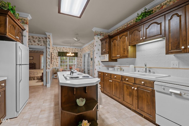 414 Bakewell Ct, Wake Forest, NC 27587 - kitchen with white appliances, wallpapered walls, crown molding, a sink, and open shelves