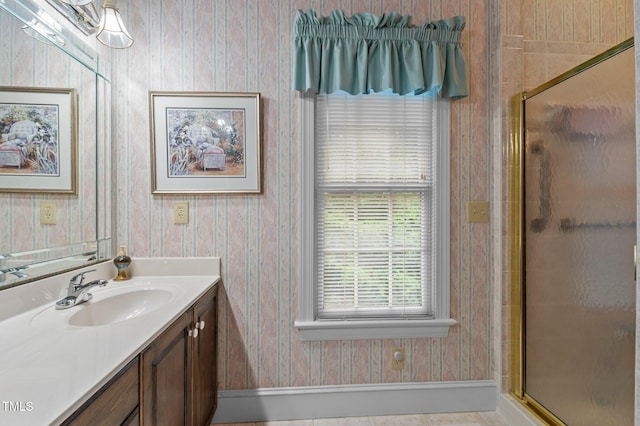 414 Bakewell Ct, Wake Forest, NC 27587 - bathroom with vanity, baseboards, a shower stall, and wallpapered walls
