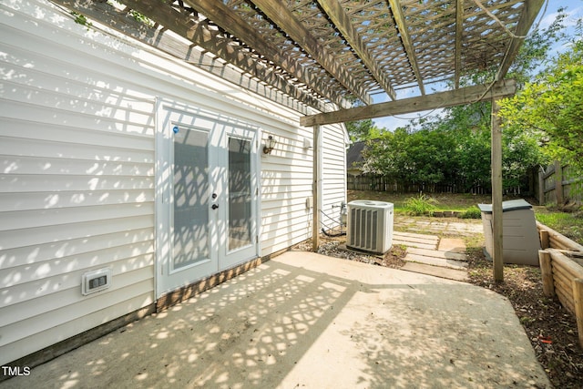 5006 Silhouette Dr, Durham, NC 27713 - view of patio with a pergola, central air condition unit, and french doors