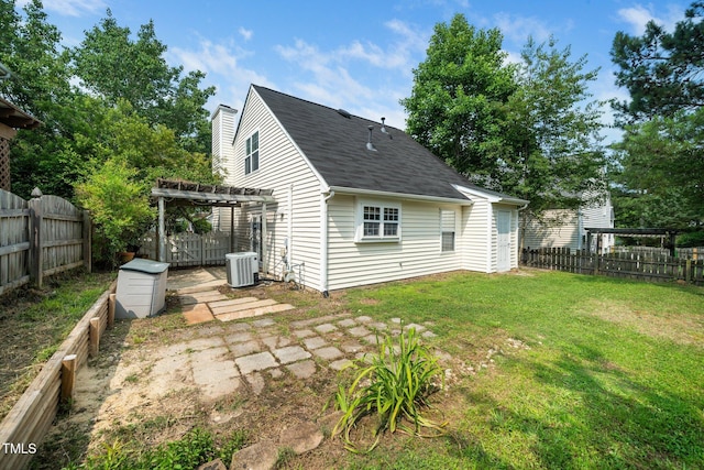 5006 Silhouette Dr, Durham, NC 27713 - back of property with a pergola, central air condition unit, a patio, and roof with shingles