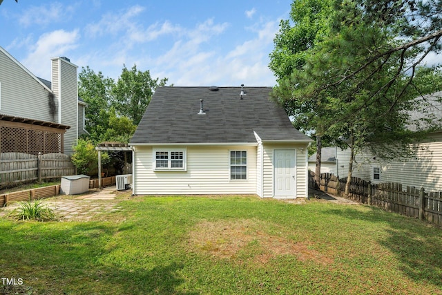 5006 Silhouette Dr, Durham, NC 27713 - rear view of property featuring central AC unit and roof with shingles