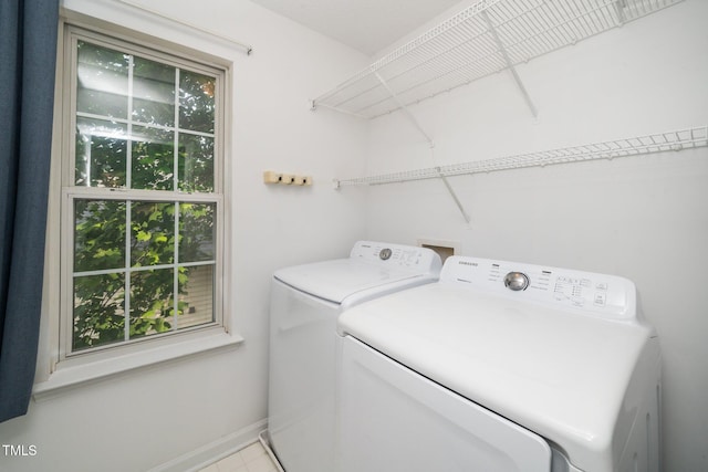 5006 Silhouette Dr, Durham, NC 27713 - washroom featuring washer and dryer and baseboards