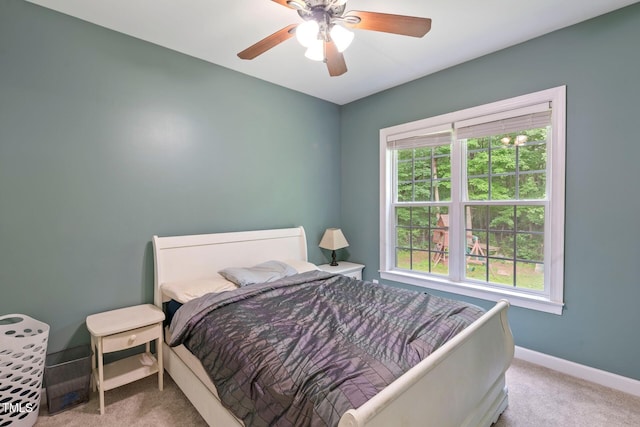 395 Timberlands Dr, Louisburg, NC 27549 - carpeted bedroom featuring baseboards and a ceiling fan