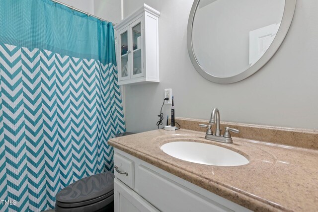 395 Timberlands Dr, Louisburg, NC 27549 - full bathroom with vanity, toilet, and a shower with shower curtain