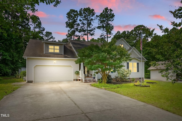 153 Hickory Nut Dr, Smithfield, NC 27577 - view of front of property featuring concrete driveway, a yard, and a garage