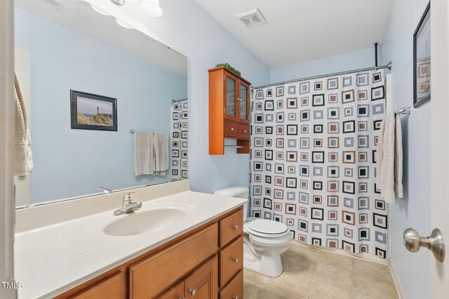 153 Hickory Nut Dr, Smithfield, NC 27577 - bathroom featuring toilet, vanity, curtained shower, and tile patterned floors
