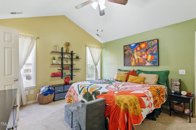 153 Hickory Nut Dr, Smithfield, NC 27577 - bedroom featuring light colored carpet, lofted ceiling, multiple windows, and a ceiling fan