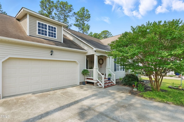 153 Hickory Nut Dr, Smithfield, NC 27577 - view of front of property featuring concrete driveway, a shingled roof, and an attached garage