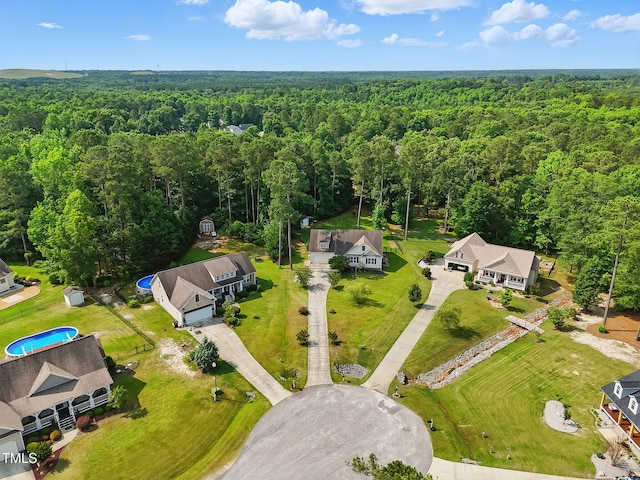 153 Hickory Nut Dr, Smithfield, NC 27577 - view of property location with a forest