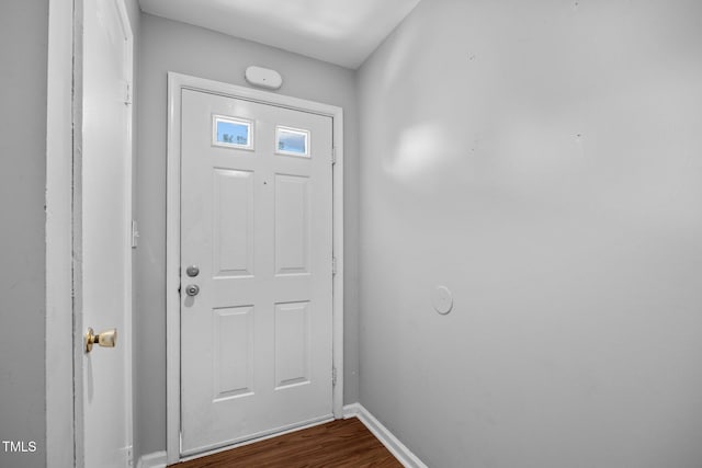 134 Kingsbury Dr, Chapel Hill, NC 27514 - entryway with baseboards and dark wood-type flooring