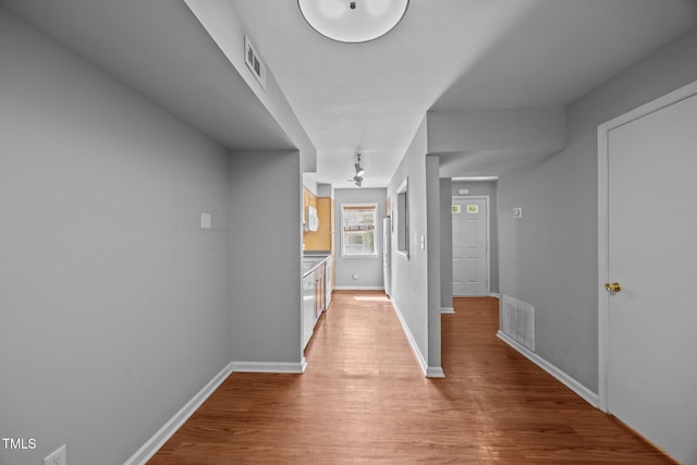 134 Kingsbury Dr, Chapel Hill, NC 27514 - hallway featuring light wood-style flooring and baseboards
