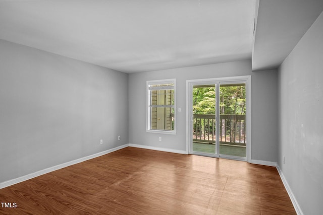 134 Kingsbury Dr, Chapel Hill, NC 27514 - empty room with wood finished floors and baseboards