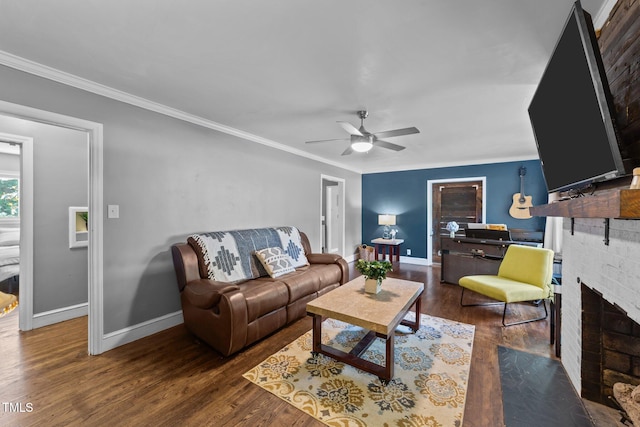 2005 Cole Mill Rd, Durham, NC 27712 - living room featuring a brick fireplace, baseboards, crown molding, wood finished floors, and a ceiling fan