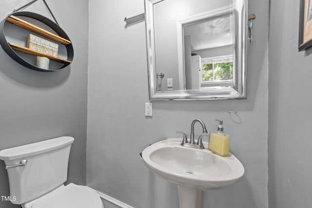 2005 Cole Mill Rd, Durham, NC 27712 - bathroom featuring toilet and a sink