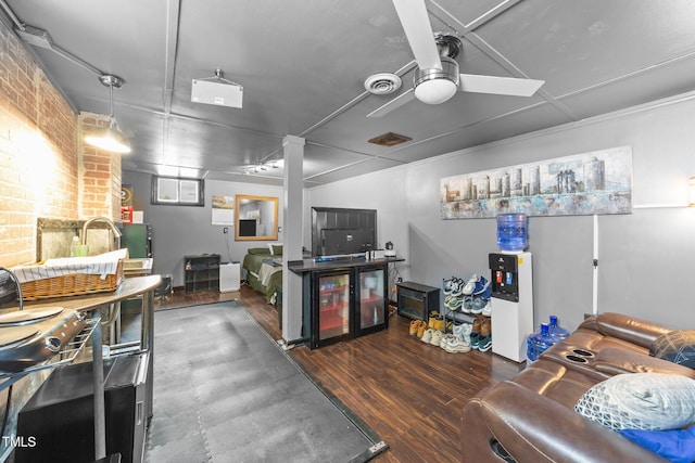 2005 Cole Mill Rd, Durham, NC 27712 - living area featuring a ceiling fan, wood finished floors, and brick wall