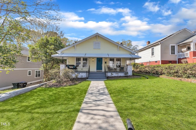 602 Dunbar St, Durham, NC 27701 - bungalow-style house featuring a porch and a front yard