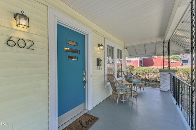 602 Dunbar St, Durham, NC 27701 - doorway to property featuring covered porch