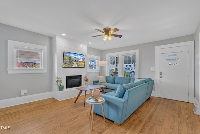 602 Dunbar St, Durham, NC 27701 - living area with a fireplace, ceiling fan, light wood finished floors, recessed lighting, and baseboards