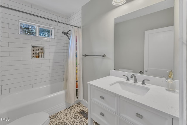 602 Dunbar St, Durham, NC 27701 - full bath featuring toilet, vanity, shower / bath combo with shower curtain, and tile patterned floors
