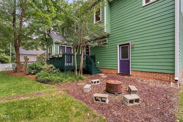 2724 Glastonbury Rd, Apex, NC 27539 - rear view of property with a deck