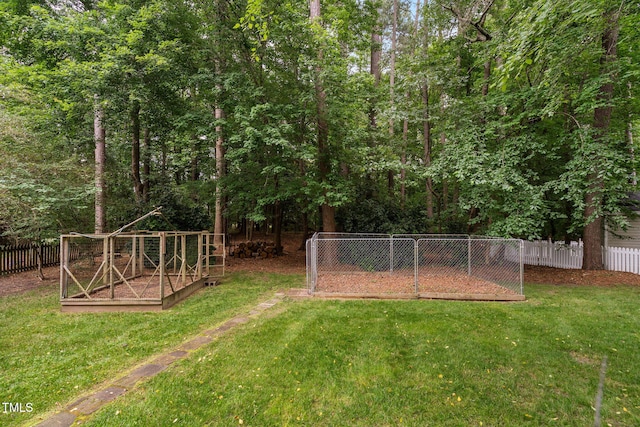 2724 Glastonbury Rd, Apex, NC 27539 - view of yard with a garden