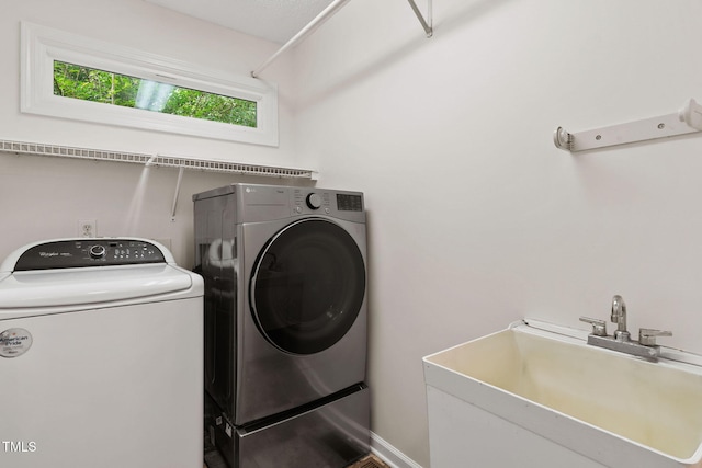2724 Glastonbury Rd, Apex, NC 27539 - laundry room featuring washer and dryer