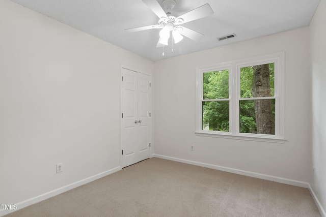 2724 Glastonbury Rd, Apex, NC 27539 - empty room featuring baseboards, light carpet, and ceiling fan