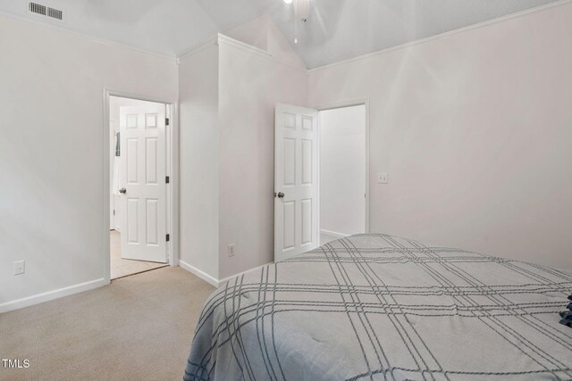2724 Glastonbury Rd, Apex, NC 27539 - carpeted bedroom featuring vaulted ceiling and baseboards