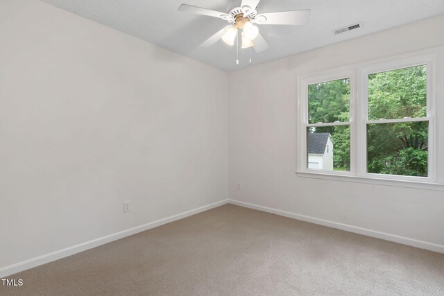 2724 Glastonbury Rd, Apex, NC 27539 - empty room with light colored carpet, baseboards, and a ceiling fan