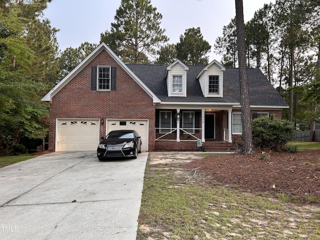 7832 Shuttle Rd, Fayetteville, NC 28311 - view of front of property featuring a porch, brick siding, concrete driveway, an attached garage, and roof with shingles