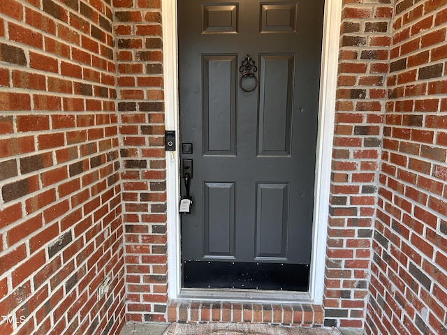 7832 Shuttle Rd, Fayetteville, NC 28311 - property entrance featuring brick siding