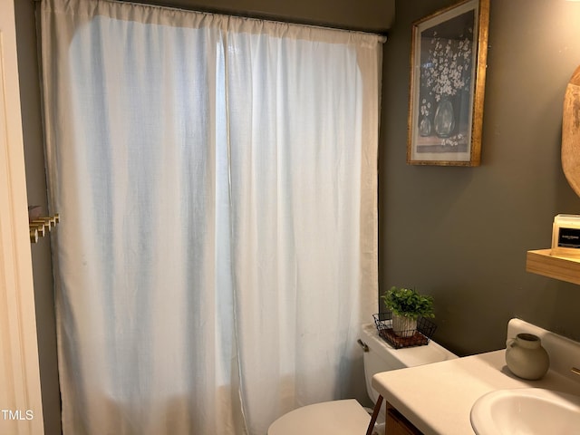 7832 Shuttle Rd, Fayetteville, NC 28311 - bathroom featuring toilet, vanity, and a shower with curtain