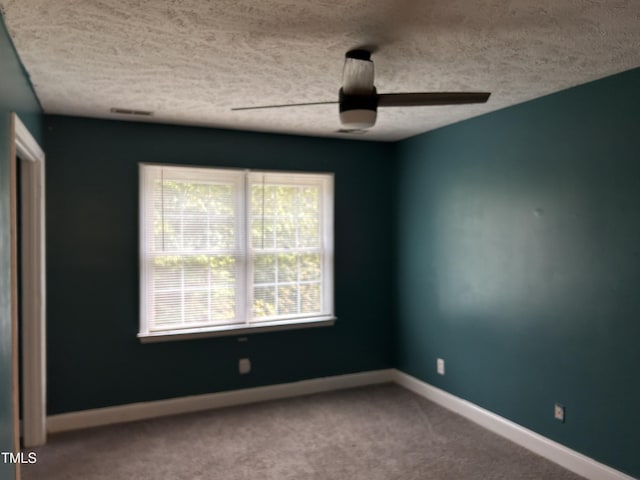 7832 Shuttle Rd, Fayetteville, NC 28311 - empty room with ceiling fan, carpet, baseboards, and a textured ceiling
